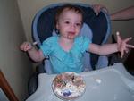 Messy with her 2nd birthday cake