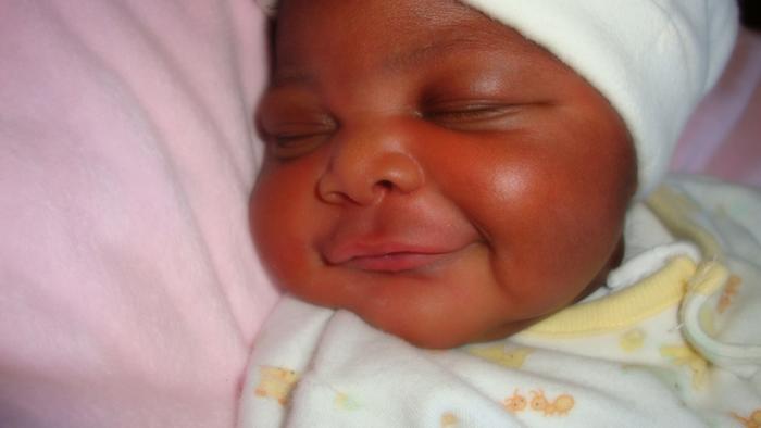 Smiling at 4 days old!