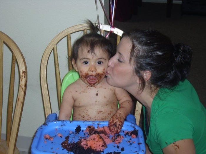 I'm one year old!!!  My mommy likes chocolate cake too!!!  Even if it's on my face!!!