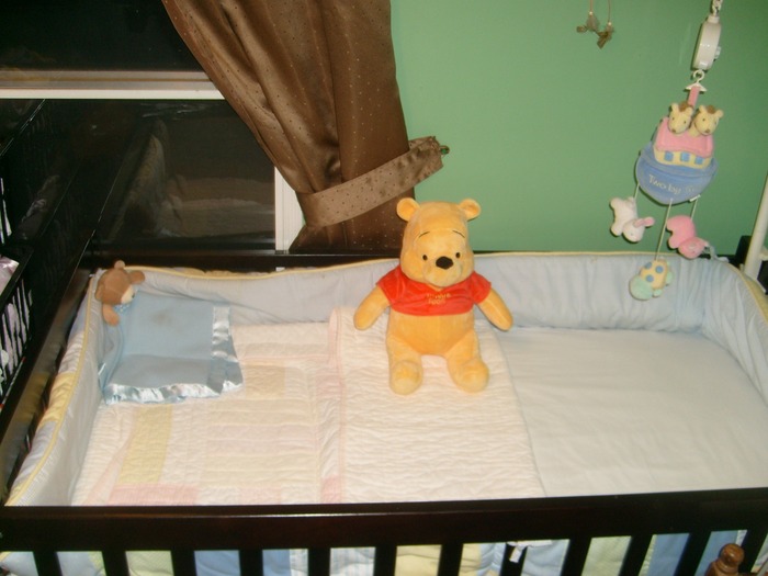 Crib and Pooh bear