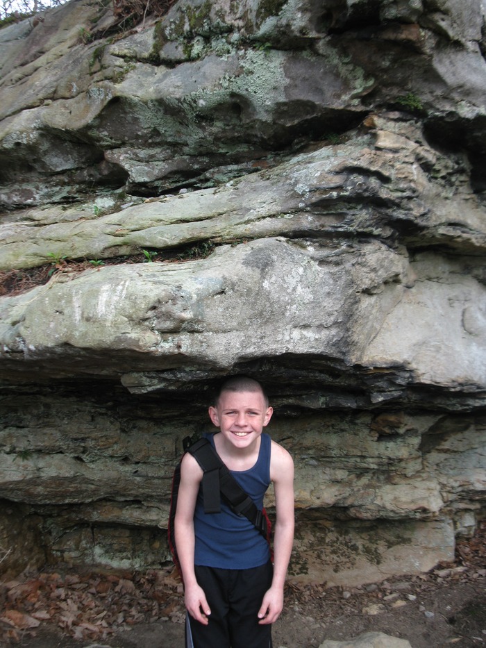 this is Ryan standing under a boulder