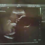 28wks 1day...finally a profile pic! and those are totally my lips! love it!!