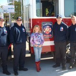Hannah with members of our fire dept.