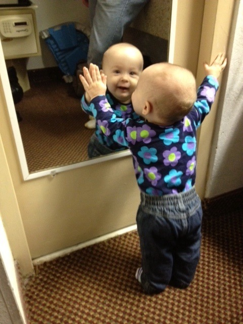 Checking herself out at the hotel