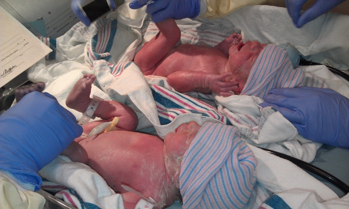 William and Margot were born on Jan 1 at 1:22 and 1:23 pm.  They were 5'4 and 5'2 pounds at birth.