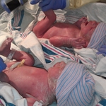 William and Margot were born on Jan 1 at 1:22 and 1:23 pm.  They were 5'4 and 5'2 pounds at birth.