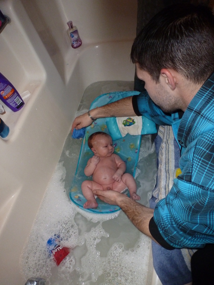 Daddy giving his very first bath ever!!