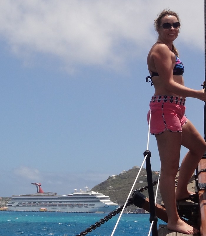 Riding on the bow of a moving tall ship in the Caribbean turquoise water = FUN!!