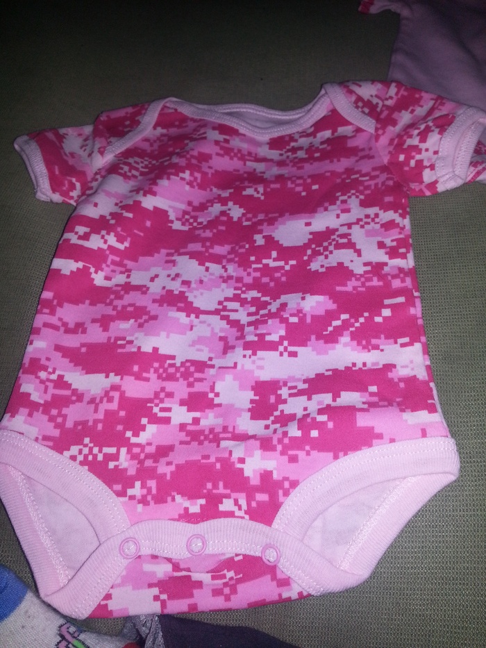 Her daddy went to drill for the weekend at camp Aterberry and came back with a pink digital onsie.<3