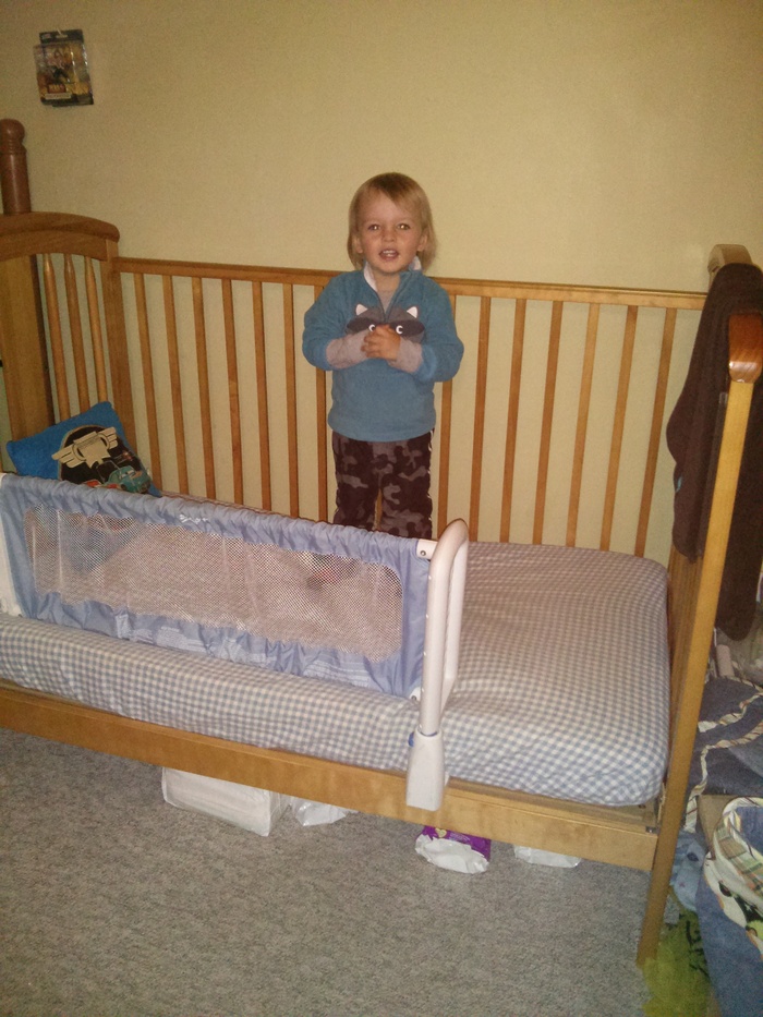 Excited about his big boy bed