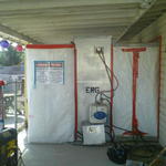 The asbestos containment and shower for the workers out the backdoor.
