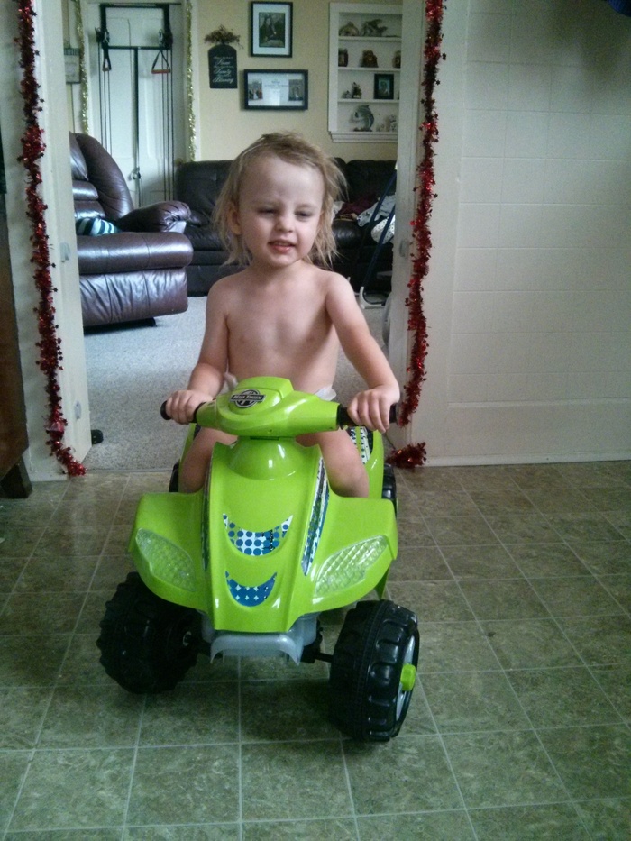 Preston going for a ride on his new toy he got for Christmas 