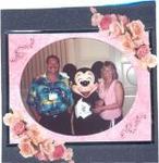 Hubby and I with Micky Mouse