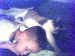 Jaylen sleeping with his cat, White Girl