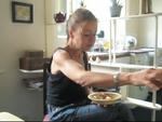 this is me, eating breakfast...giving Misty a little bit of apple. (pic taken in Mama's kitchen)