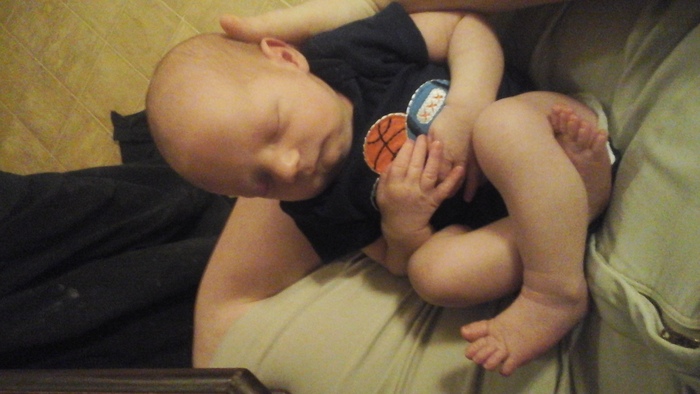his favorite position to be in. at 4 days old!