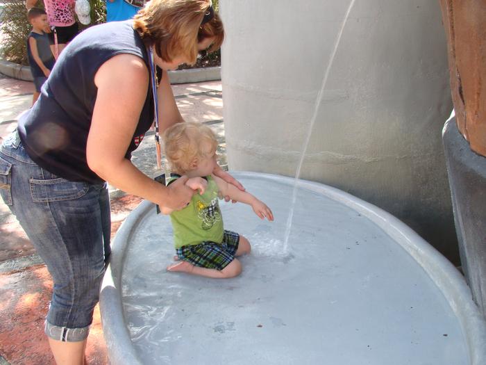 Mommy and Noah at Universal playing in the water