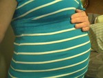side view of baby bump