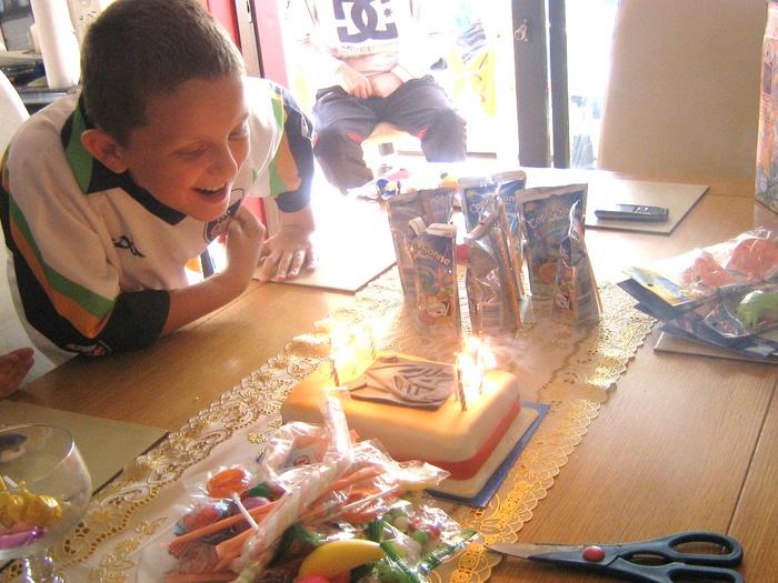 craig blowing out his birthday candles ,.