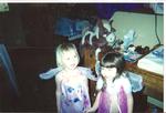 my 2 great nieces ages 3 playing dressup fairies.