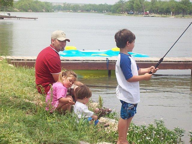my son and grandkids fishing