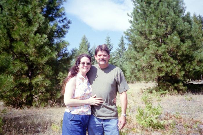 Me and the Dh on our property before the house was built.