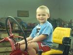 Robbie at 4. He is into anything that has a motor on it...lol