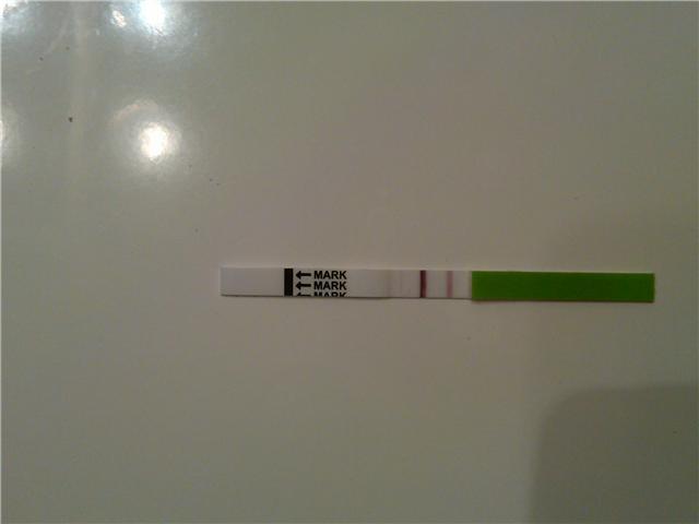 Picture of my positive OPK on 11/23 at 10:30 p.m.... WEIRD!!  
