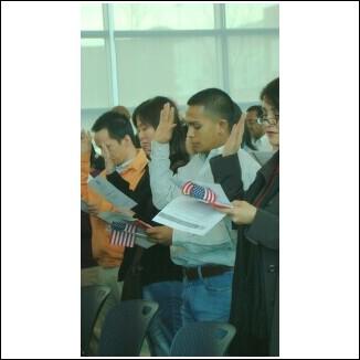Elmer taking his citizenship oath