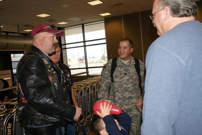 Patriot Guard Riders at the airport to welcome DH home