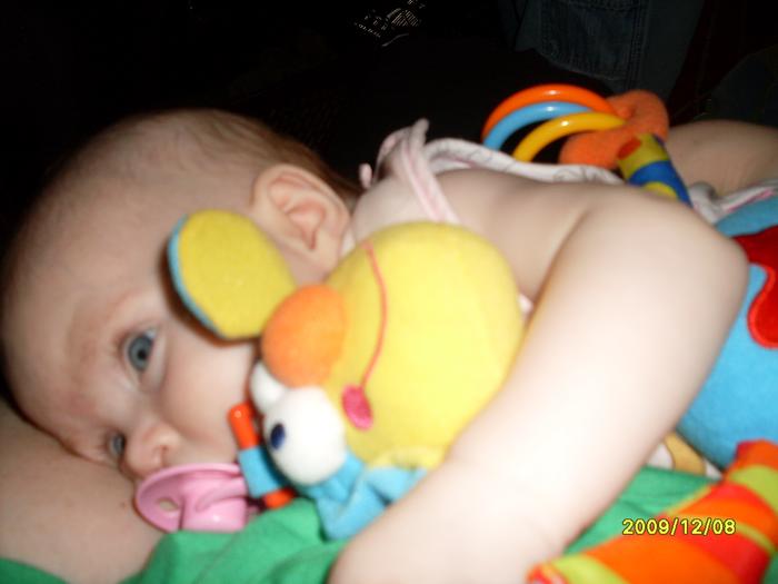 cuddling her toy