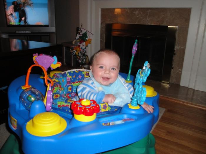 4.5 months....loving the exersaucer