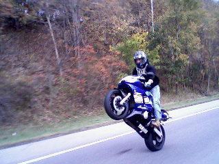 me riding a wheelie on my old r-6