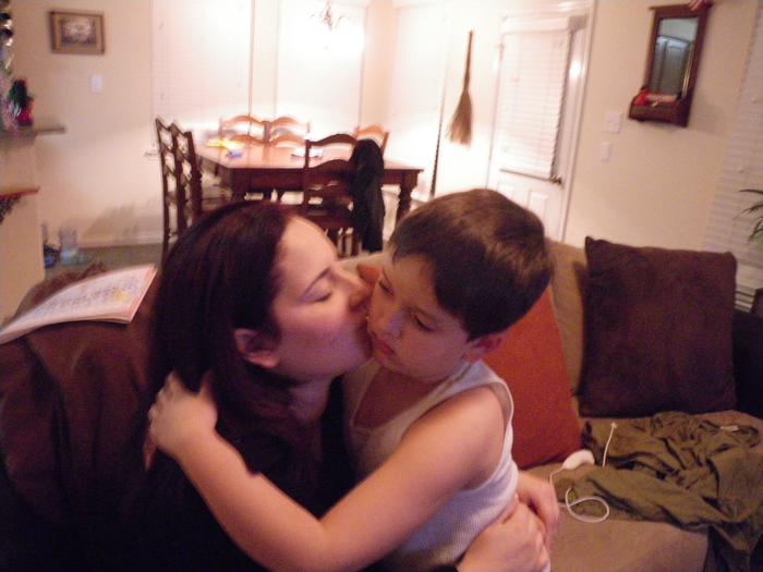 Night before becoming zipperhead, kissing my son Jay, 7 years old