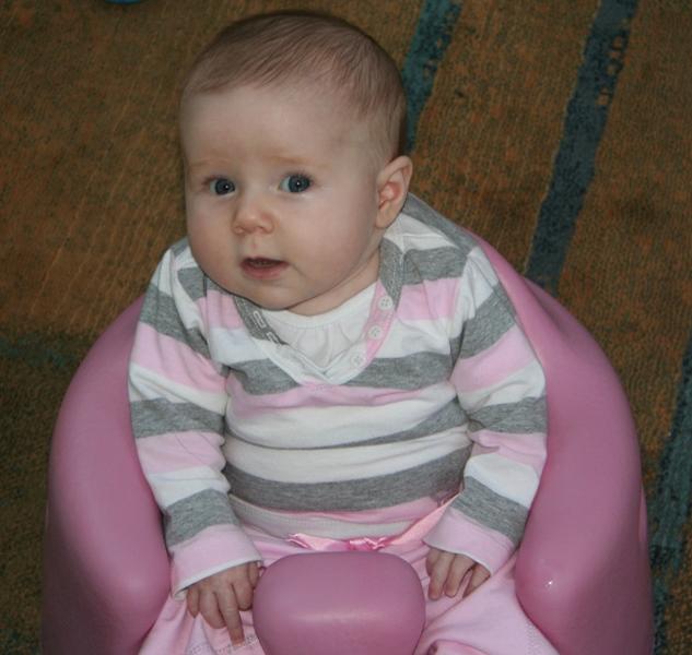 Emily Sitting in her Bumbo at 3mths