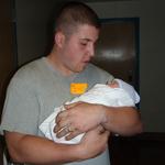 daddy holding her for the 1st time