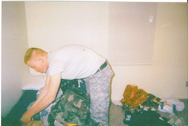My husband unpacking after deployment