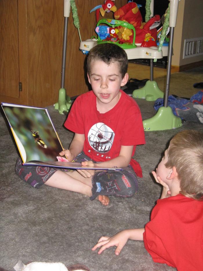 Tristan reading to Hunter:~)