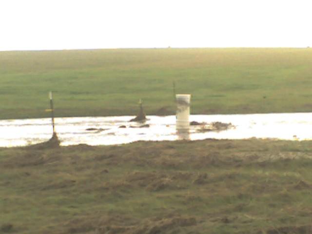 Mean neighbor's well casing after the flood washed away all the dirt around it. LOL  