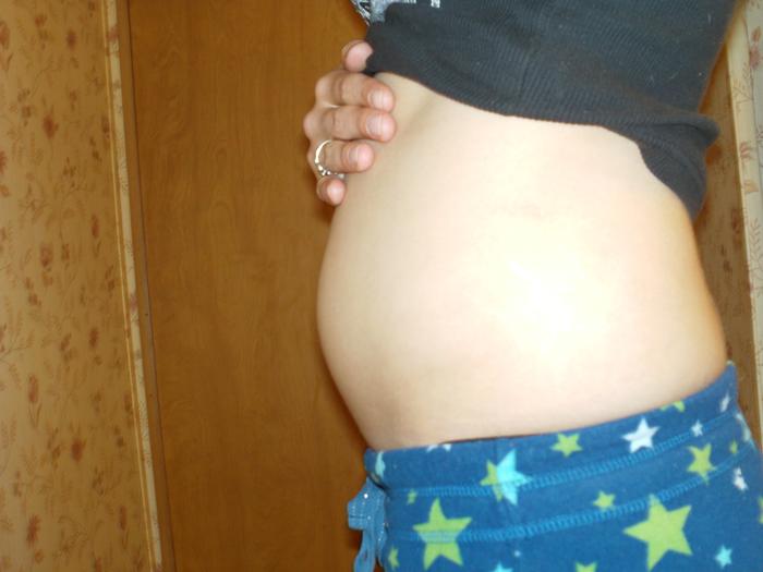 My litttttttle baby bump haha taken at exactly 8 weeks
