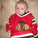 Celebrating our Hawks win!  Hopefully we will still have the Cup when this jersey fits him!