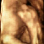 28 weeks 1 day, she didin't want us to see her face :(