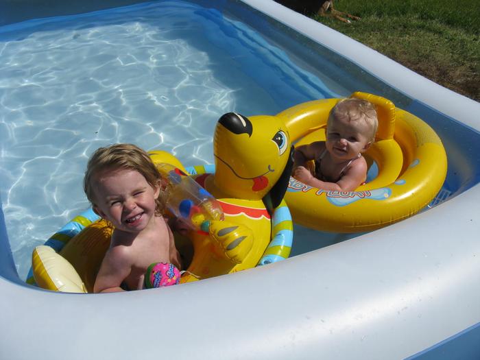 Dalton 21 months and Taylor 10 months. Lovin' the pool:~)