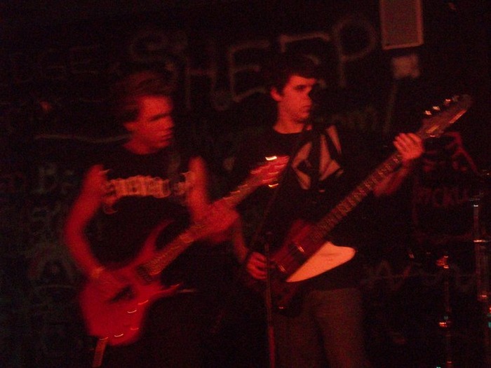 Lucas playing a gig.  On the left