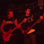 Lucas playing a gig.  On the left