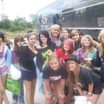 Mary (in the hat) & friends boarding bus to camp