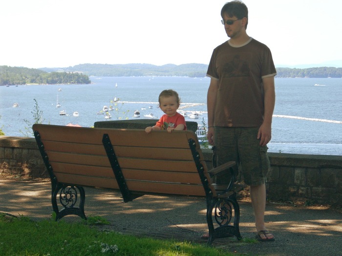 Standing with Daddy in front of Lake Champlain at the park near our house