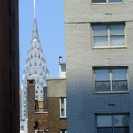 Chrysler Building peeking through other buildings