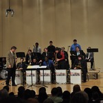My son in red/black playing solo, jazz band