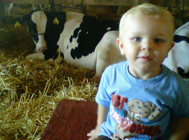 at the county fair, he was kind scared of the cows lol